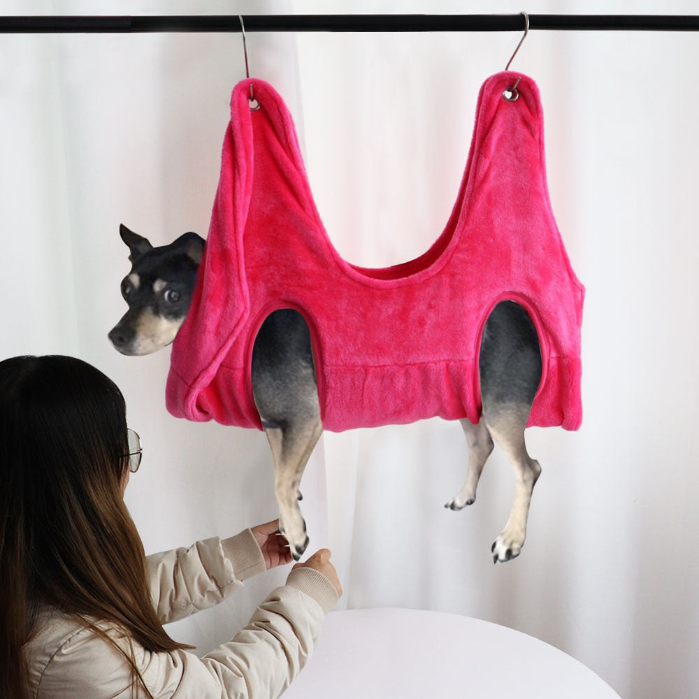 Pet grooming hammock for safe nail trimming
