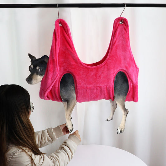 Pet grooming hammock for safe nail trimming